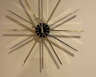 $450. George Nelson design Star clock from DWR.   24" diameter.  Currently online for $650 plus tax and shipping.