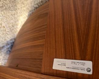 base of chair showing designer name