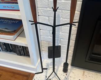 $240. Nelson Fireplace tool set from Design Within Reach.  Currently online for $395 plus tax and shipping.  Design was created by George Nelson in 1951 while working at Herman Miller.