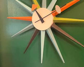 $390. George Nelson design sunburst clock.  19" diameter.  Currently online at DWR for $645 plus tax and shipping. 