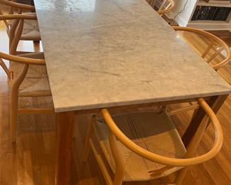$800. Room & Board Linden Dining table with marble top.  Currently online for $3199 plus tax and delivery.  Table is 72"l x 36'w x 29"h.  Top comes off for moving but is very heavy - needs four people to be safe.   Marble has patina from use.   $2000 Six Carl Hansen and Son Wishbone chairs from Design Within Reach.  Currently online for $1065 each plus tax and shipping.  
