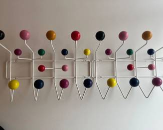 $200 each.   Eames Hang it All from Design Within Reach Eames  one has sold but they are shown here side by side. 14.7"h x 19.7" x 6"d.   Currently online for $295 plus tax and shipping.