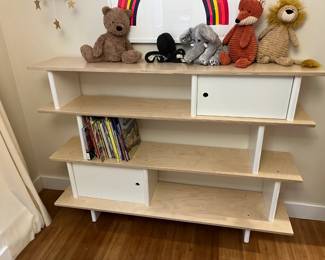 $440.   Oeuf Mini Library white and birch. 59"w x 42"h x12"d. Currently online for $780 plus tax and shipping.  Toys and books separately during in-person shopping hours only.