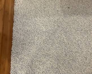 $500 Arden Loop Rug from Room & Board.  6'7" x 9'10". Currently online for $1800 plus tax and shipping.  Bluish hues.  