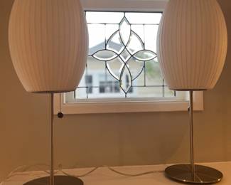 $600 for the pair.  DWR Nelson Lotus Cigar Table Lamps.  26"h.  Currently online for $595 each plus tax and shipping