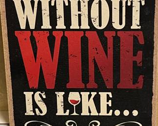 Small Sign. A Day Without Wine is Like...Just Kidding, I Would Have No Idea
