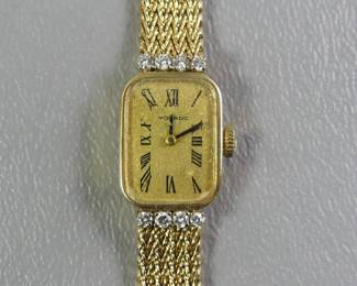 Movado gold and diamond ladies watch