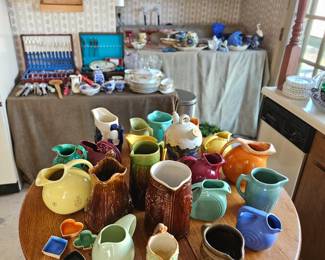 Oak table with vintage pottery.