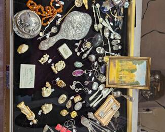 Japanese carved Netsukes, Satsuma buttons, sterling items, chalkware chick's, jewelry. 