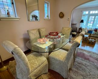 Glass top pedestal dining room table, six matching dining room chairs