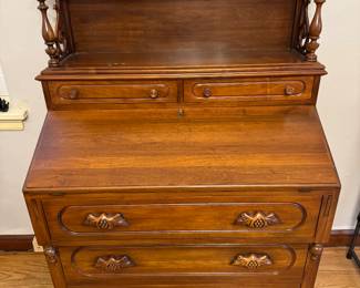 Beautiful antique walnut bedroom set that includes desk with hutch, dresser with mirror, night stand and two matching twin beds