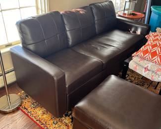 Small comfy sectional &
Fun rug 
Treadmill 