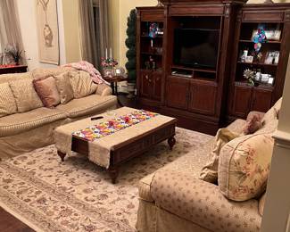 Set of matching couches , entertainment center , coffee table 
