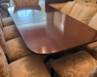Dining table in mint condition with 8 chairs , captains chair , settee