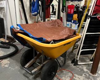 Large heavy duty wheel barrel, ladders , 
