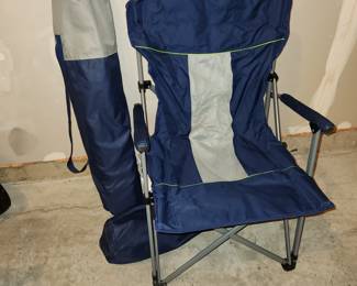 2 folding chairs in bagslocated in garage