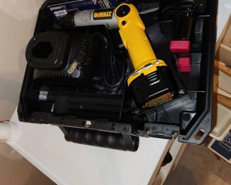 DeWalt screw gun. located in garage