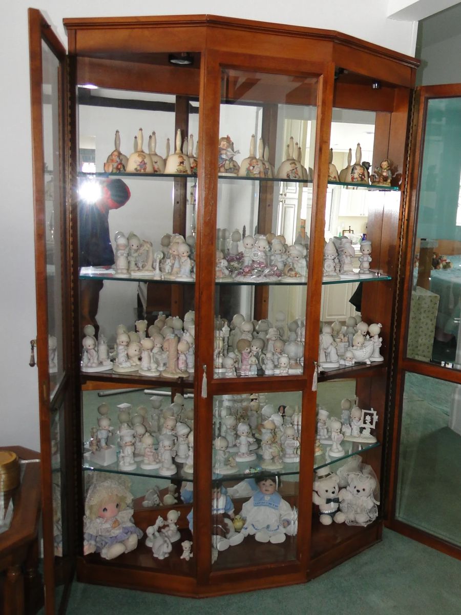 Curio Cabinet filled with Precious Moments, Hummel/Goebel. Have Original Boxes