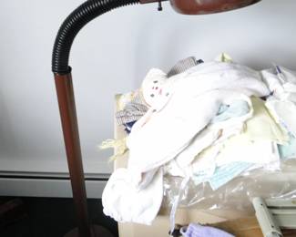 Gooseneck lamp, vintage baby clothes