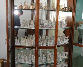 Curio Cabinet filled with Precious Moments, Hummel/Goebel. Have Original Boxes