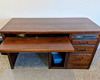 Saturday's Price is $100.  Martin Furniture - Large Desk - has computer hookup on top right panel - 55.5" long, 24.5" deep, 29" tall.