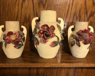 RARE MANUFACTURING S IGNED POTTERY GLASS SET OF VASES FROM THE LAWRENCE FISHER ESTATE SALE WITH ORIGINAL PHOTO OF FISHER FAMILY MEMBER IN FRONT OF AND ON THE FIRE PLACE MANTLE.
