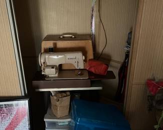Vintage singer sewing machine and sewing supplies
