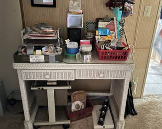 Wicker desk or vanity lots of office supplies or school supplies