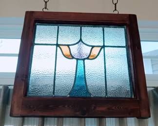 Multiple antique stained glass panels