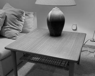 SOLD……….$300.00………….Danish Teak Caned Square Side Table with magazine rack, the caning does have a few spots that are unraveled , see following photo.  Measurements: 27 3/4” W x 17 1/2” H