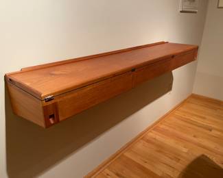 SOLD………Unique and Rare!  MCM Arne Hovmand Olsen Teak Floating Desk/Shelf with 3 drawers.  Folded Closed Measurements: 58”W x 12D x 8”H