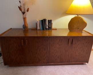  $150.00……….Large Oak Cabinet,  measures: 67”W x 24”D x 26” H.  It has a tiny ding in the lower left corner please see following photo 