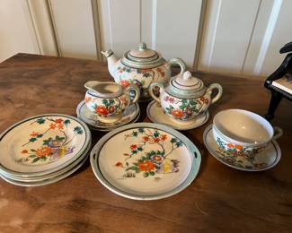 Assembled hand painted porcelain children’s tea dish ware 