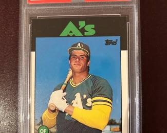 Jose Canseco - 1986 Topps Traded - Rookie Card - The black border makes it difficult to find Near Mint to Mint quality cards.  This card is graded Near Mint to Mint - PSA 8 - $59.00