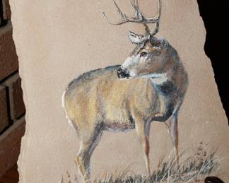 Elk painting on stone