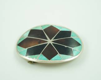 Inlaid turquoise belt buckle