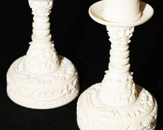 Carved ornate candle holders
