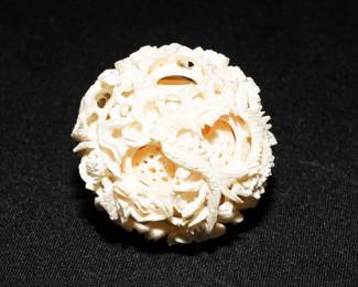 Vintage carved puzzle ball with dragon motif