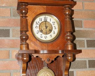 Antique German wall clock. There are many clocks within this 5000+ sq ft home and all are in working condition.