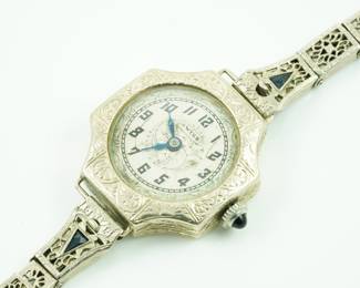 Swiss filigree watch with inlaid onyx