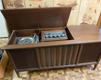 . . . Sylvania tube radio and stereo cabinet