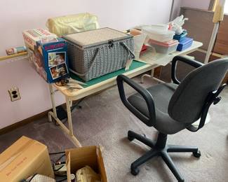 . . . our sewing room has at least six sewing machines!! Here we have a sewing table, seweing cabinet, and office chair 