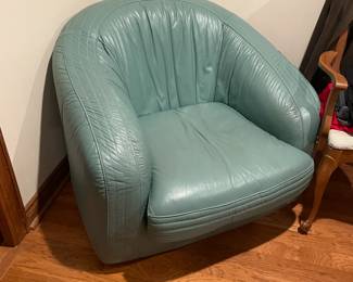 . . . love this turquoise-colored leather chair