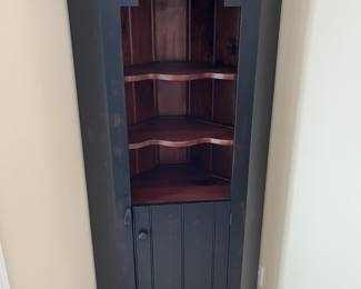 Rustic corner cabinet.