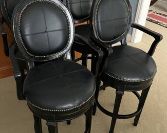 Four matching barstools by Hillsdale Furniture.