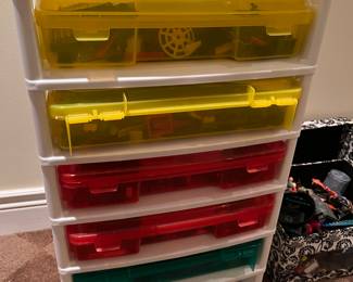 Storage container loaded with Legos.
