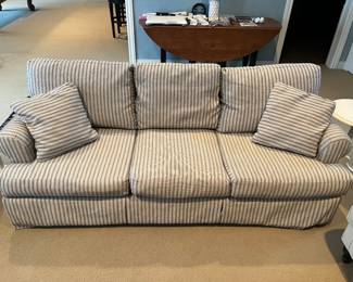 Upholstered couch by Better By Design.