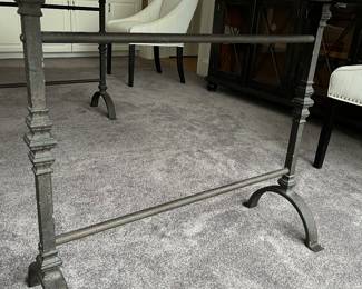 Close-up view of legs/base for dining table.