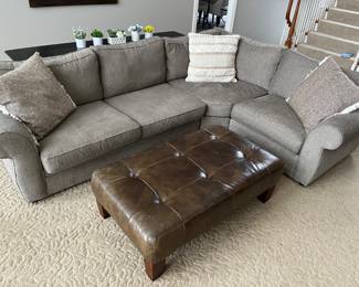 Pottery Barn sectional sofa with taupe chenille basketweave fabric; Pottery Barn ottoman; numerous quality throw pillows throughout the house.