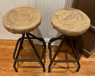 Pair of rustic burlap-covered stools.